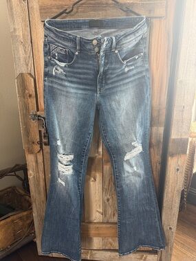 Buckle Black Women's Distressed flare jeans.